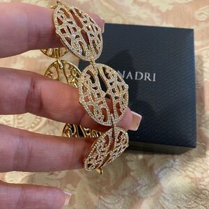 Nadri bracelet in gold tone setting with fine crystals. Look like real diamonds.